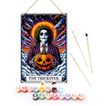 Vintage rustic metal poster 'The Trickster' with paint set, featuring vibrant artwork and painting supplies.